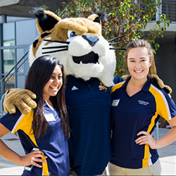 Tour guides with Rufus the Bobcat