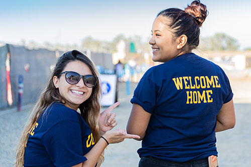 Students wearing welcome home t-shirt